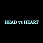 A black background with the words head vs heart in white letters.