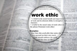 A dictionary page with the word work ethic under it.